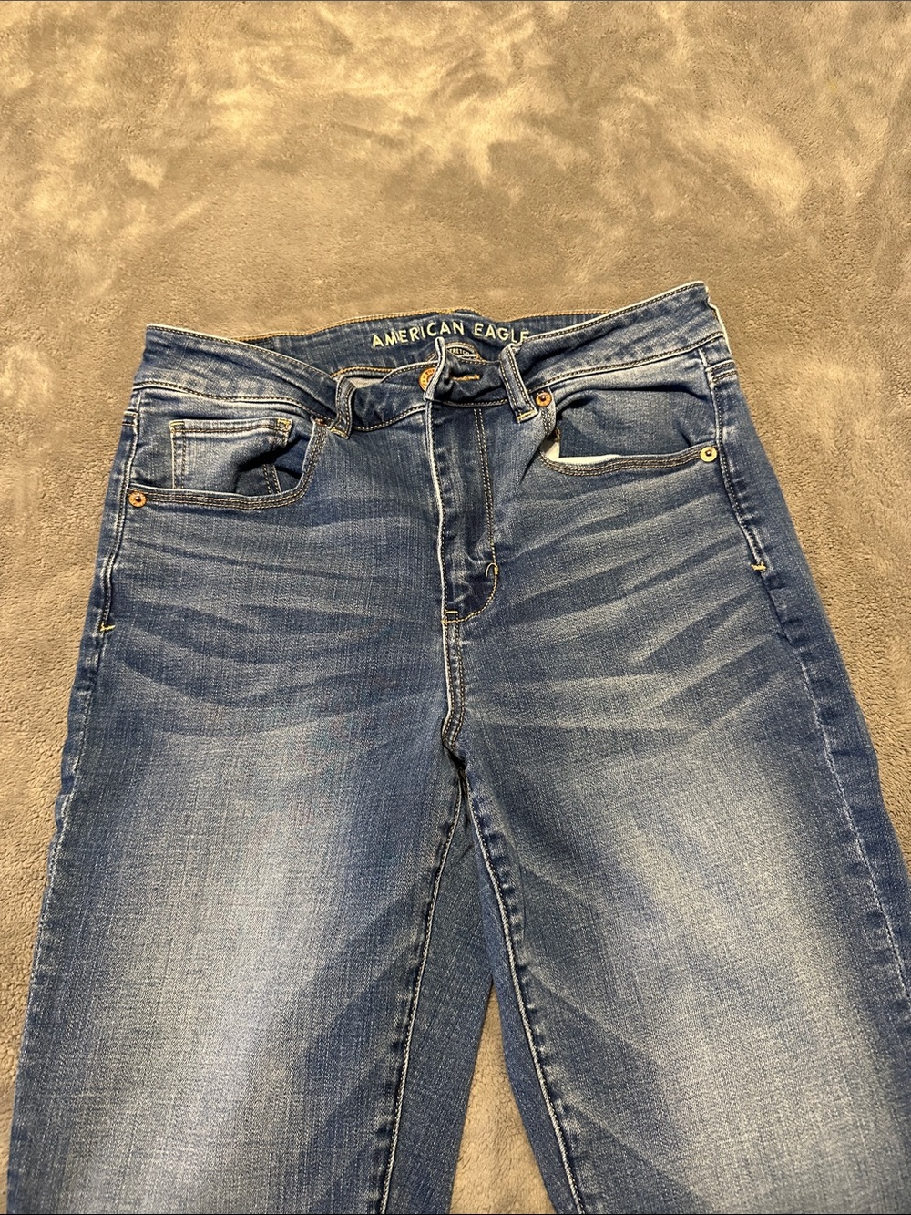 American Eagle Outfitters High-Rise Faded Blue Jeans